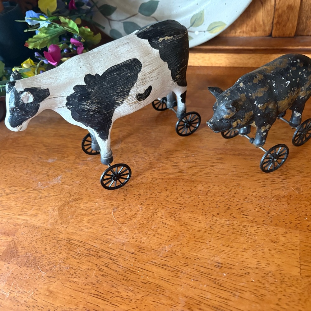 Primitive Black and White Cow & Brown Pig on Wheels Figurines